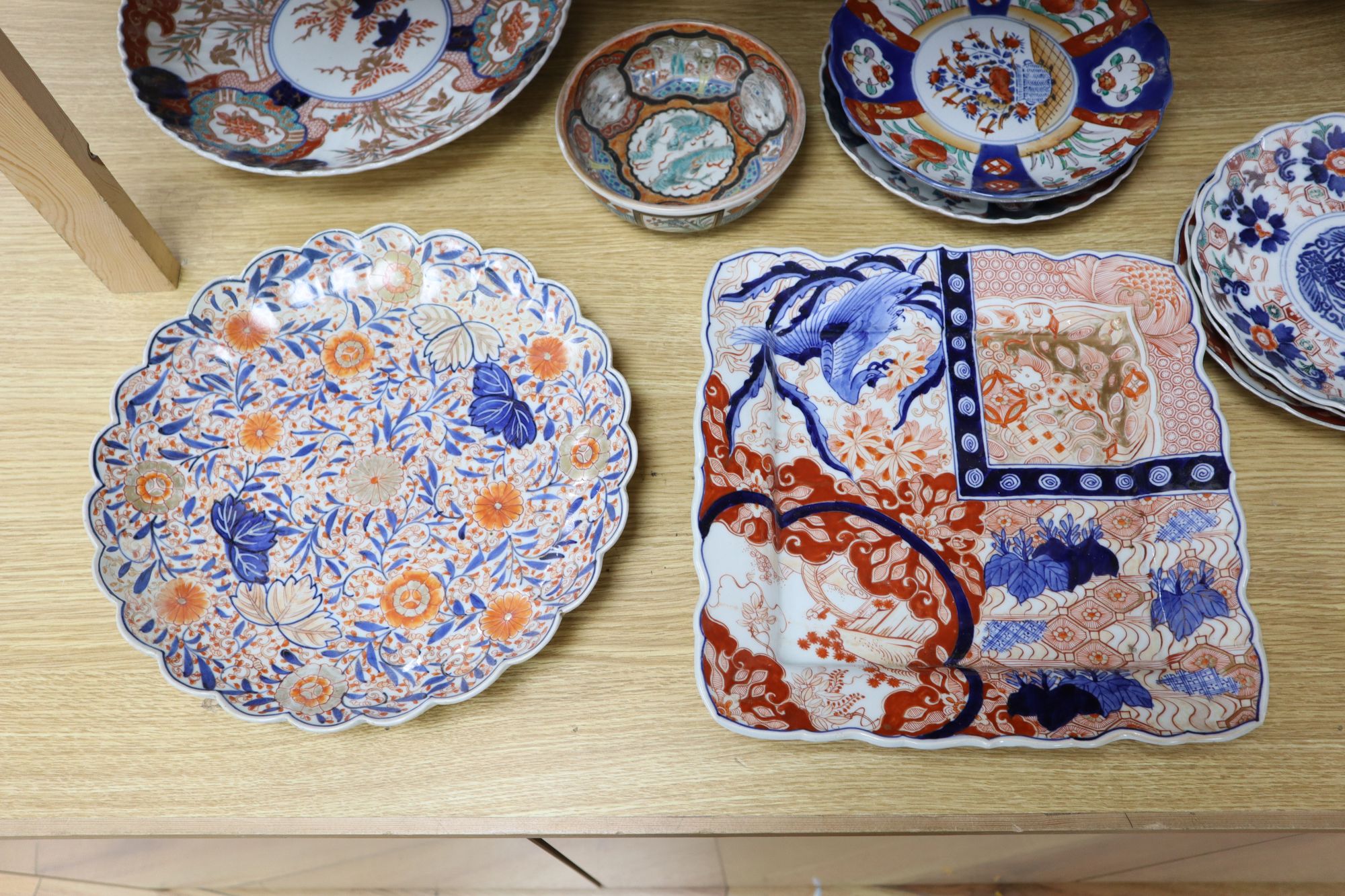 A collection of Japanese Imari dishes, bowls and a large square dish